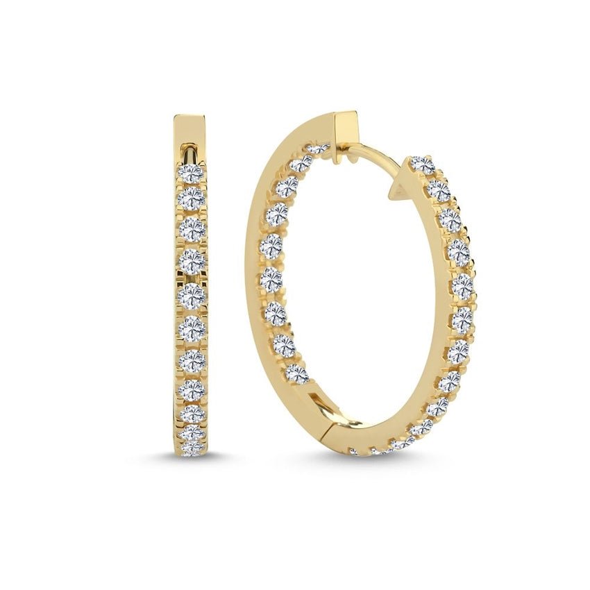 Nuran creoler i 14 kt guld med 0,88 ct hvide diamanter Ø23 – elegant og tidløst design.